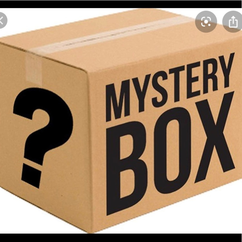 Mystery box included 2 outfits , jewelery /hair